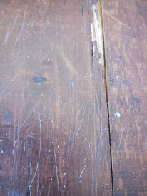 scratched floorboards