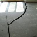 earthquake crack unreinforced concrete slab