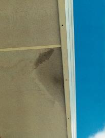 stains caused by concealed gutter overflowing