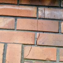HCS walls crack in brick veneer